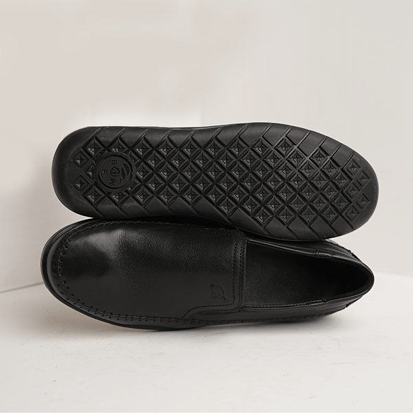 Havana Moc-Stitch Slip-On in Black — rubber sole